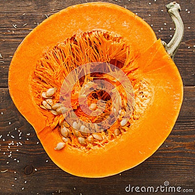 Round orange pumpkin half in cut Stock Photo