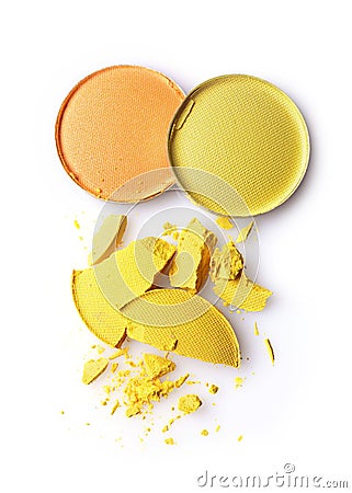 Round orange and yellow crashed eyeshadow for makeup as sample of cosmetics product Stock Photo