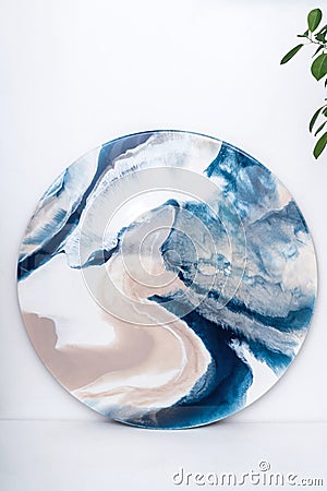 Round painting in technik fluid art, resin art. Artistic concept. Stock Photo