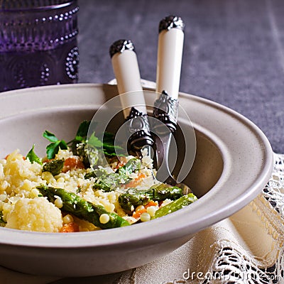 Round pasta with vegetables Stock Photo