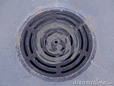 Round sewer manhole top view round shape Stock Photo