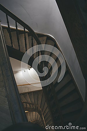 round staircase of an unusual, interesting shape in an old house Stock Photo