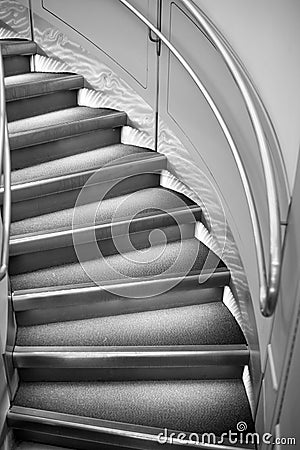 Round stairs or ladder with handrail, modern architecture Stock Photo
