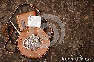 Round steampunk bag with designer`s essentials Editorial Stock Photo