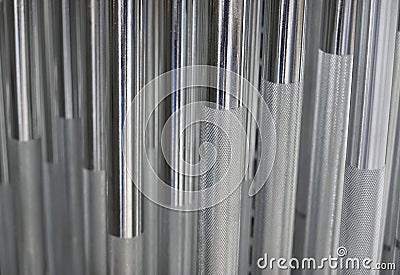 Round steel bars. Chrome steel bars. Stainless steel bars. Stock Photo