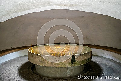 Round table with lighted candles in the memory of the victims from the communist prison, Sighet Memorial, Romania Editorial Stock Photo