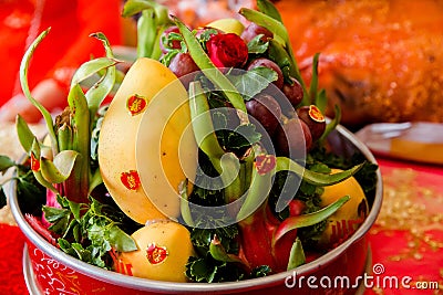 Round tray contains fruits such as mango, dragon fruit, pear, apple ... Stock Photo