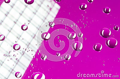 Magenta round water droplets background with pixel pattern. Stock Photo