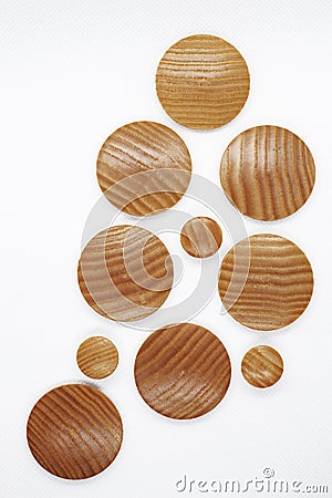 Round wooden plugs for covering screws heads Stock Photo