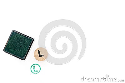 round wooden stamp letter Stock Photo