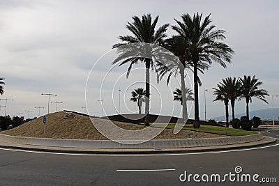Roundabout with grass and sand Stock Photo
