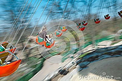 On the nice roundabout going fast Stock Photo