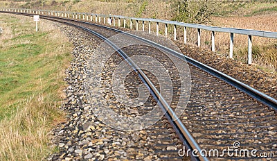 Rounding of railway abandoned rusty,. Empty turning single track of railways. Stock Photo