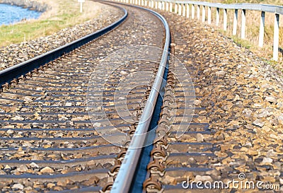 Rounding of railway abandoned rusty,. Empty turning single track of railways. Stock Photo