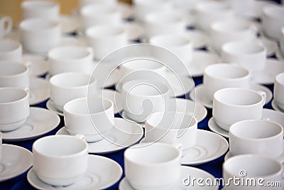 roup of empty Many rows of white ceramic coffee or tea cups Stock Photo