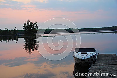 Route Bay Sunrise Reflection on water Stock Photo