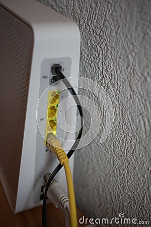 Router with cables and connectors flashes continuously Stock Photo