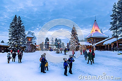 Rovaniemi - December 16, 2017: Travelers in the Santa Claus village of Rovaniemi, Finland Editorial Stock Photo