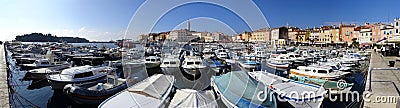 The Rovinj Harbor, Promenade, and Cathedral Tower Editorial Stock Photo