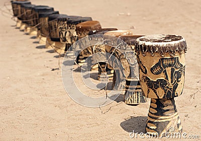 A row of African drums Stock Photo