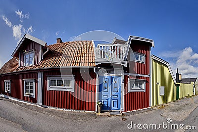 Row of ancient colorful wooden houses in the city Stock Photo