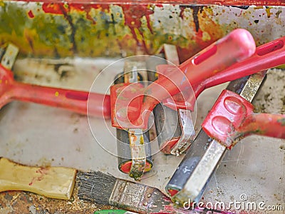 Row of artist paintbrushes closeup on artistic background Stock Photo