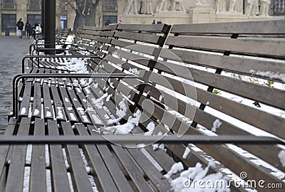 Row of the benches in the prespective with blurred background Stock Photo