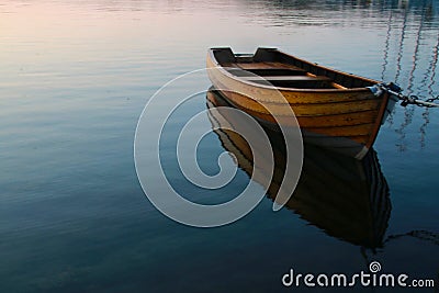 Row boat in calm water Stock Photo