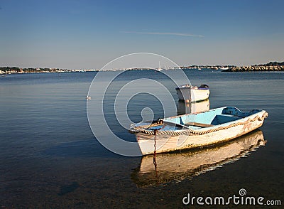 Row Boats Anchored in Poole Harbour Stock Photo