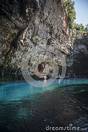 Row boats used to conduct tours inside the Melissani Lake Cave Kefalonia Editorial Stock Photo