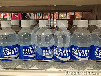A row of bottles soft drinks in the supermarket at Jakarta Editorial Stock Photo