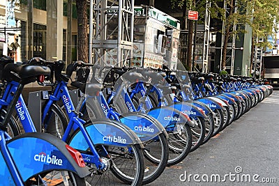 Row of bright blue bikes in Citi bike Rentals Editorial Stock Photo