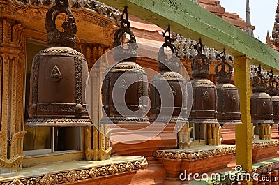 Row of Buddhist prayer bells Stock Photo