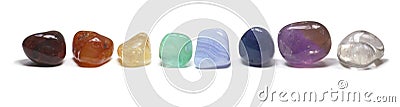 Row of chakra crystals on white Stock Photo