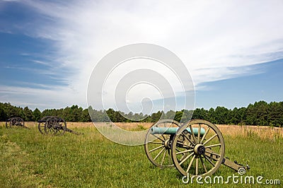 Row of civil war cannons on battlefield Stock Photo