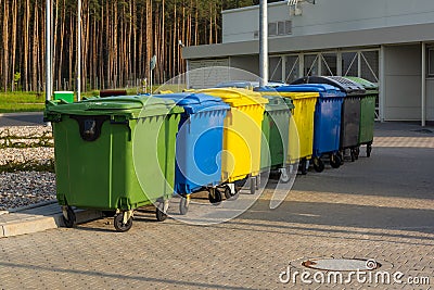 A row of colorful dustbins Stock Photo