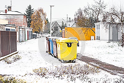 A row of colorful dustbins for waste segregation Stock Photo