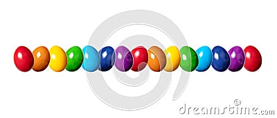 Row of slightly twisted, colorful dyed eggs, multi colored eggs Stock Photo