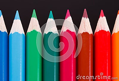 Row of coloured wood pencils Stock Photo