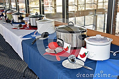 Row of crock pots for chili cook off Stock Photo