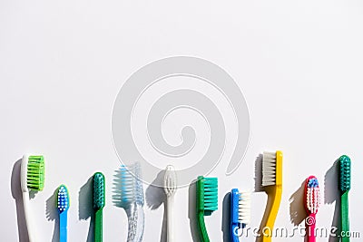 Row of different toothbrushes Stock Photo