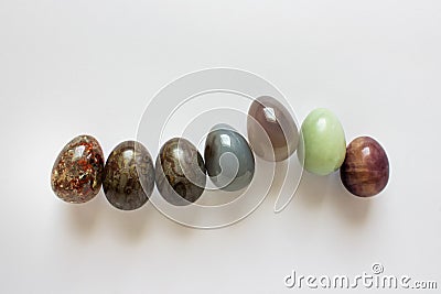 Row of Easter eggs made of precious stones Stock Photo