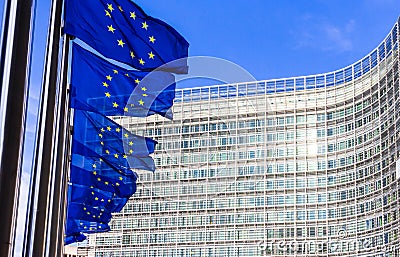Row of EU Flags in front of the European Union Commission building in Brussels Stock Photo