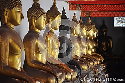 A row of figure of Buddha Stock Photo