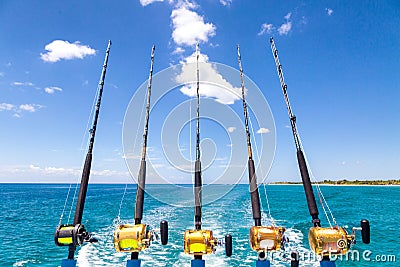 Row of Deep Sea Fishing Rods on Boat Stock Photo