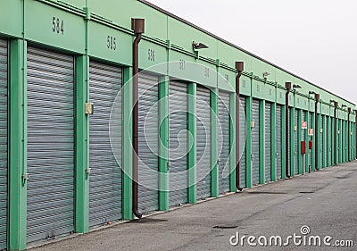 Row of Garage Lock Ups in Urban Area Stock Photo