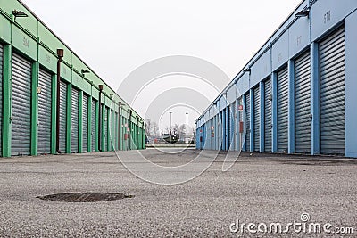 Row of Garage Lock Ups in Urban Area Stock Photo