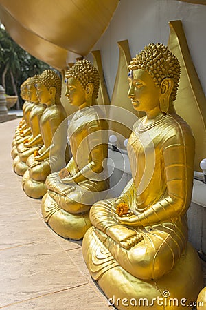 Row of Golden Buddha in Thailand Stock Photo