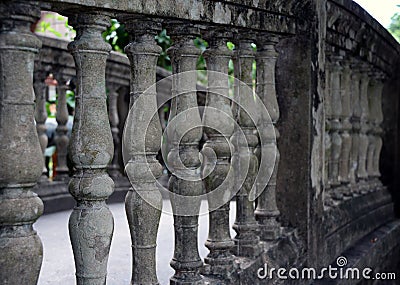 Row of gray mortar balustrades. It is the bar. Stock Photo