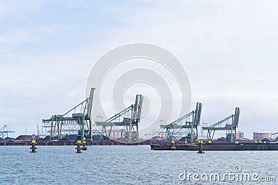 Row of harbor cranes Editorial Stock Photo